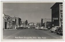 Grangeville Idaho Main Street Vintage RPPC Photo Postcard Signs Chevron Hotel ID picture