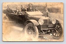 RPPC Family Three Kids in 1920s Touring Car Greet a Woman Real Photo Postcard picture