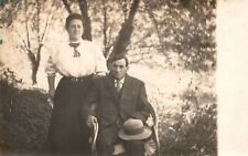 Vintage Postcard 1910's Couple Lovers Husband and Wife Sitting Outdoor picture