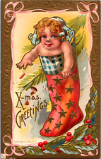 C. 1910 Lovely X-Mas Greeting Embossed Postcard Baby in A Stocking Blank picture