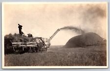 Thresher Builds Big Mound~Farmer On Wagon w/Hands On Hips Oversees~1915 RPPC picture