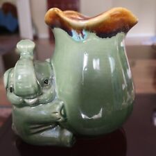 Vintage Glazed Pottery Green Elephant Hugging Vase/ Planter picture