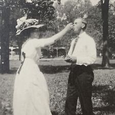 Antique RPPC Real Photograph Postcard Woman Feeding Man Silly Romantic Hat picture
