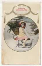 1911 Embossed German Christmas PC colorized girl on sled in snow picture