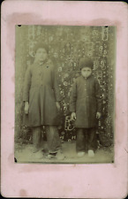 Portrait of an aristocrat Persian Qajar boy and his servant.  Photographer unkno picture