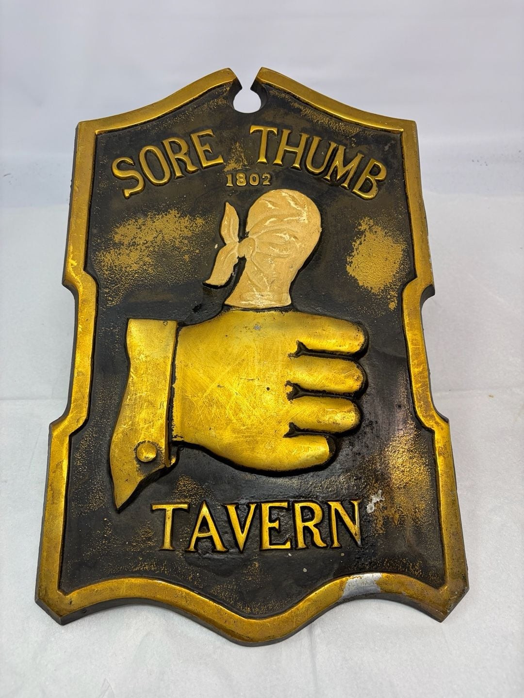 Vintage sore thumb tavern cast metal bar sign  10 inch x 16 inch made in Japan