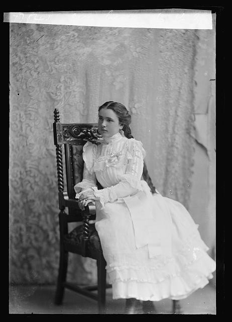 Photo:Eva Casey Portrait Woman in White Dress Antique Chair c1901-1903