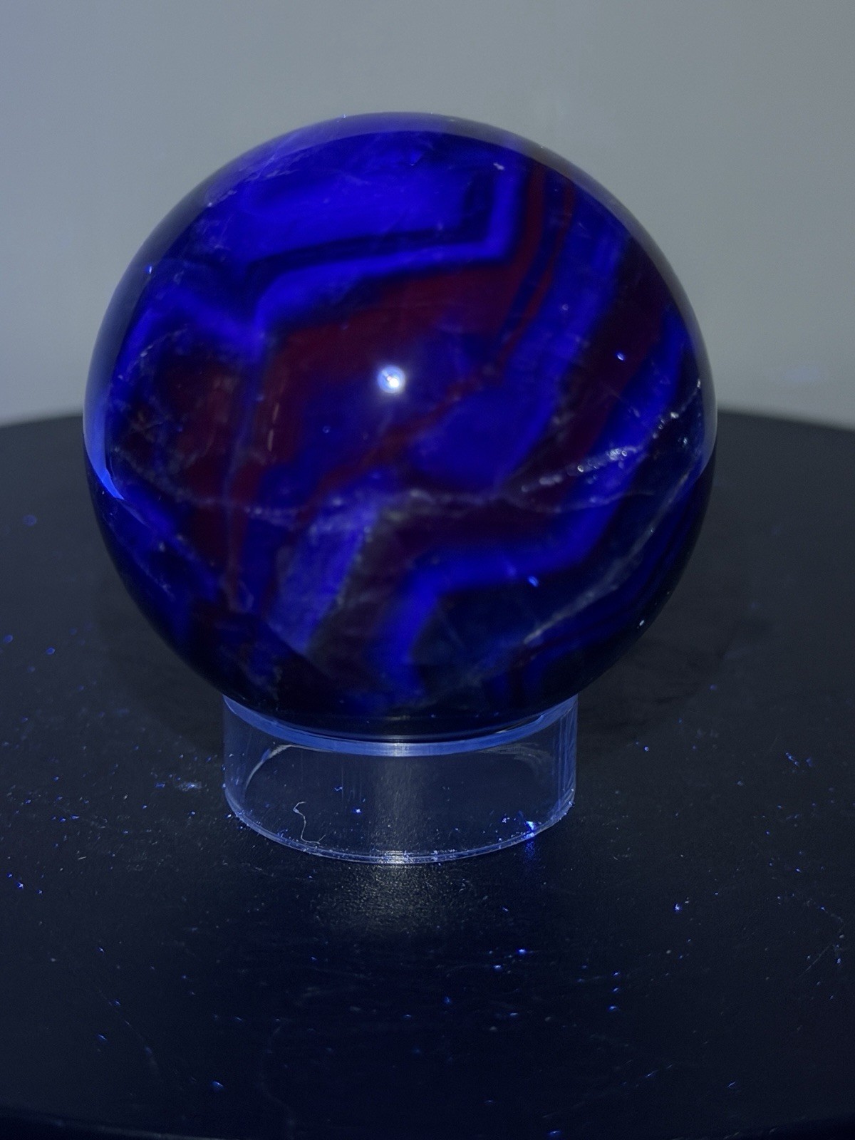 Black Rose Fluorite Sphere w/Holder UV Reactive (53 mm) - see pics & video Black Rose Fluorite Sphere w/Holder UV Reactive (53 mm) - see pics & video
