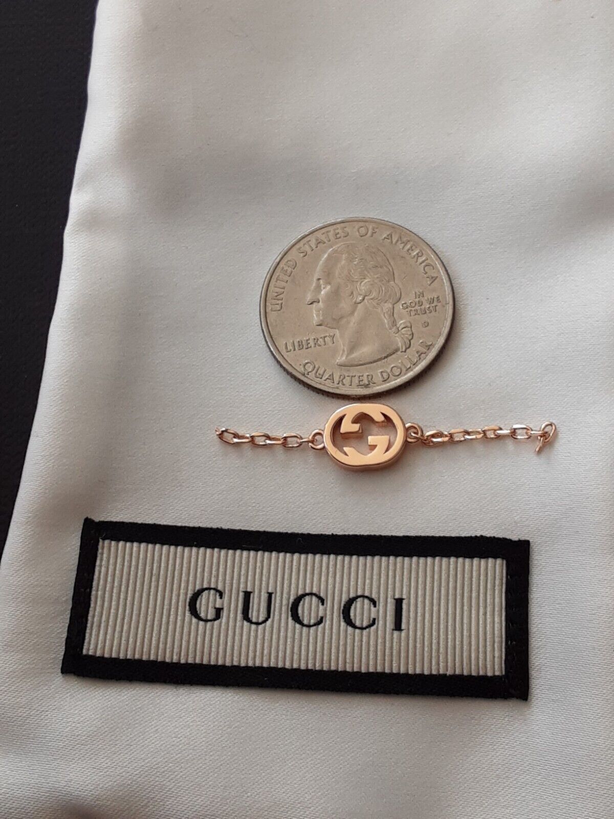 One  Gucci 1 pieces   metal zipper pull   / logo gg  rose gold