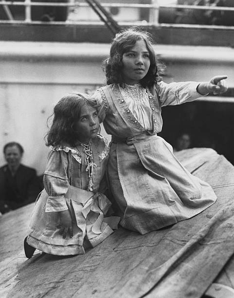 Italian immigrant children aboard ship one girl points out som- 1919 Old Photo Italian immigrant children aboard ship one girl points out som- 1919 Old Photo
