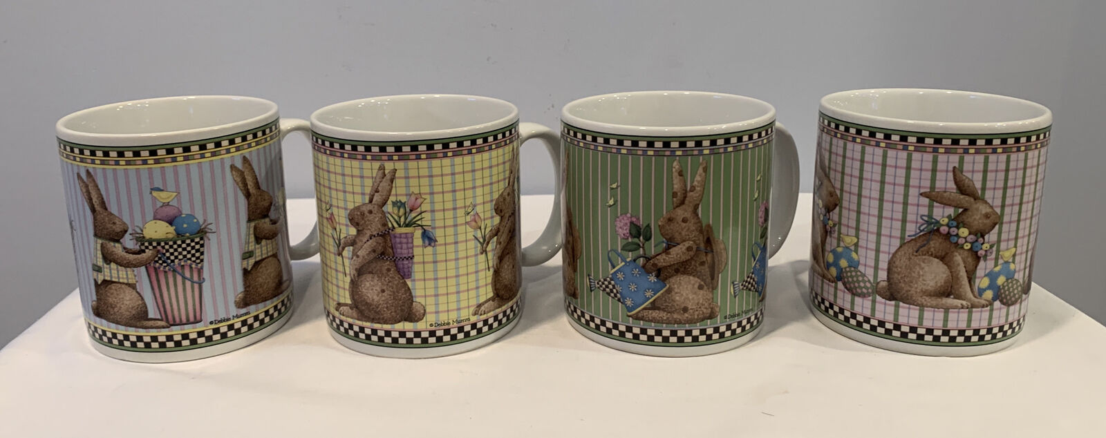 1998 Debbie Mumm Easter Bunny Set of 4 Coffee Mugs Spring Is In The Air Sakura