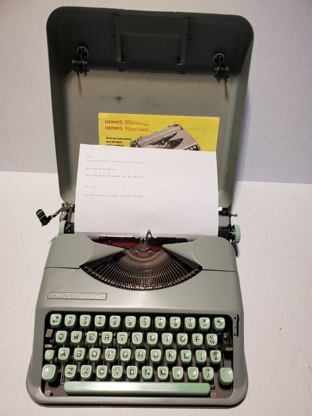 1963 Vintage HERMES ROCKET Portable Typewriter in Green Steal Case Excellent one
