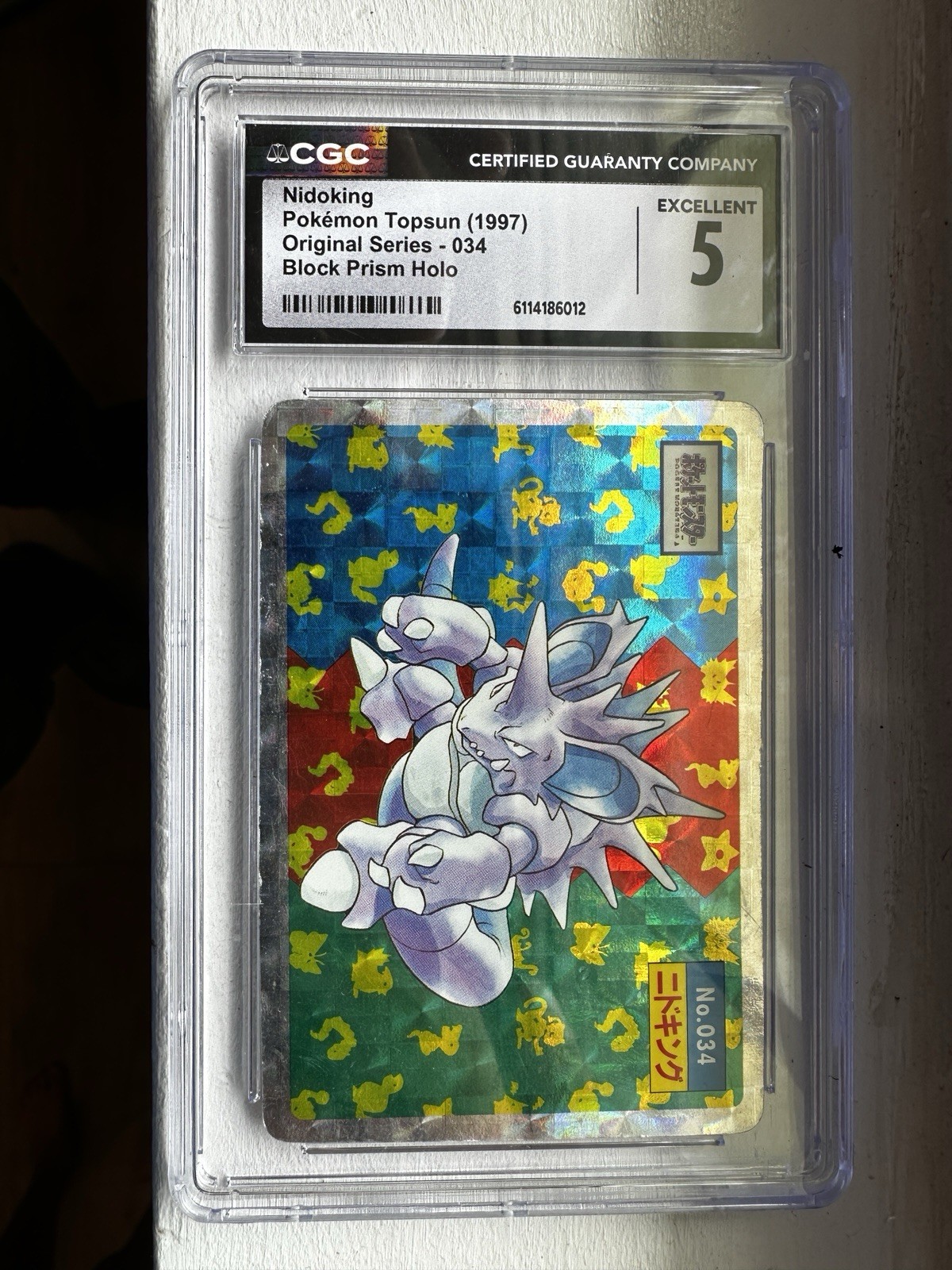 CGC 5 1997 Pokémon Topsun Original Series Nidoking #034 Checkered Prism Holo. CGC 5 1997 Pokémon Topsun Original Series Nidoking #034 Checkered Prism Holo.