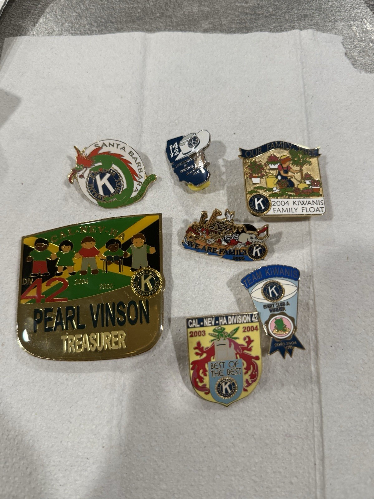Lot of 7 Vintage Kiwanis International Enamel Lapel Pins Cal-Nev-Ha Division 42