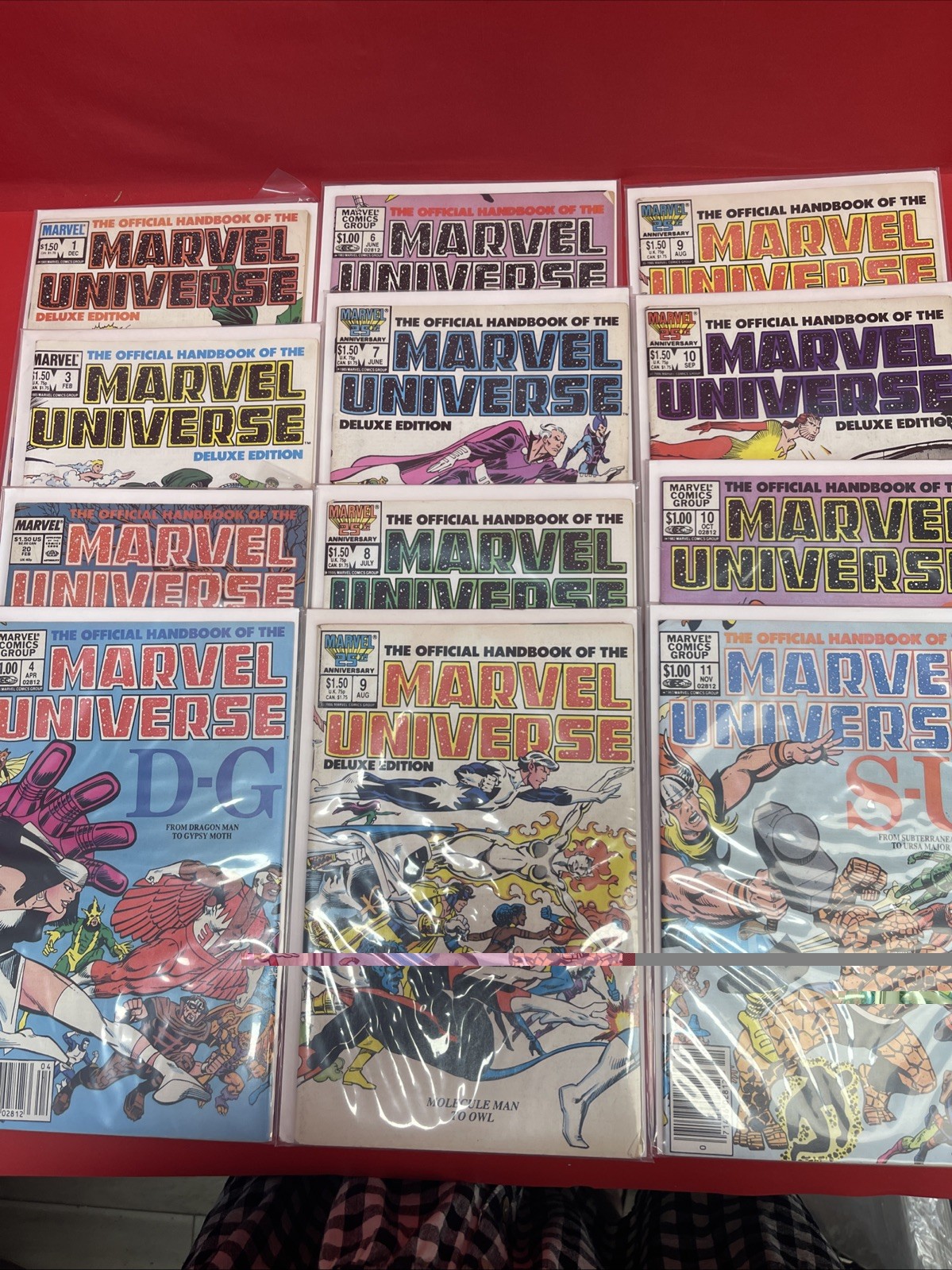 Official Handbook of the Marvel Universe Lot of 12 Marvel Comics 1983-1986.   •1