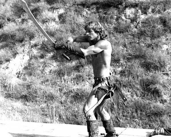 Marc Singer full length pose holding sword The Beastmaster 8x10 inch photo