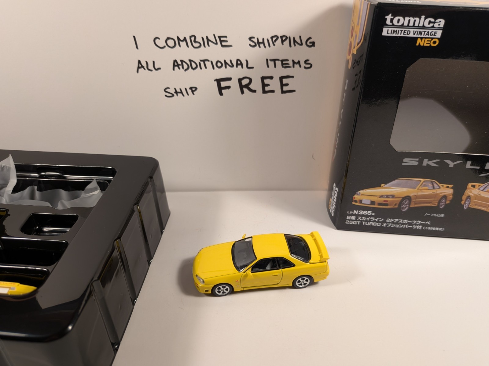 Tomytec TLV-NEO 1/64 Nissan Skyline R34 25GT Turbo Yellow LV-N365a w/ protector