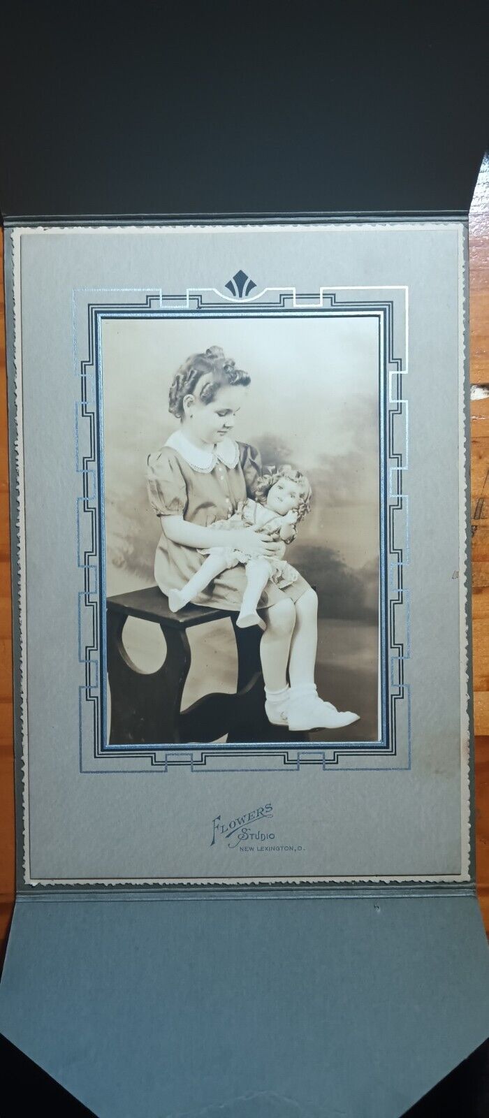 little girl and her babydoll cabinet card photo