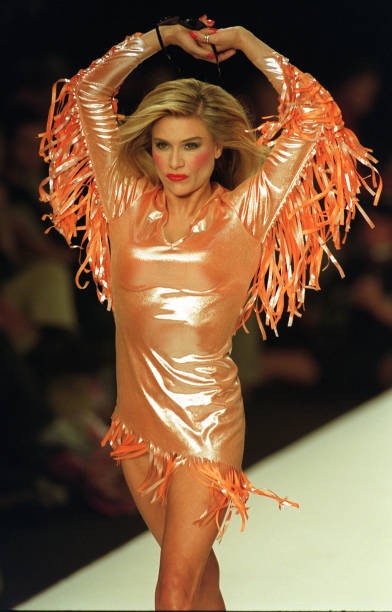 Samantha Fox models a shiny orange tassled dress for Red Or Dead t- Old Photo Samantha Fox models a shiny orange tassled dress for Red Or Dead t- Old Photo
