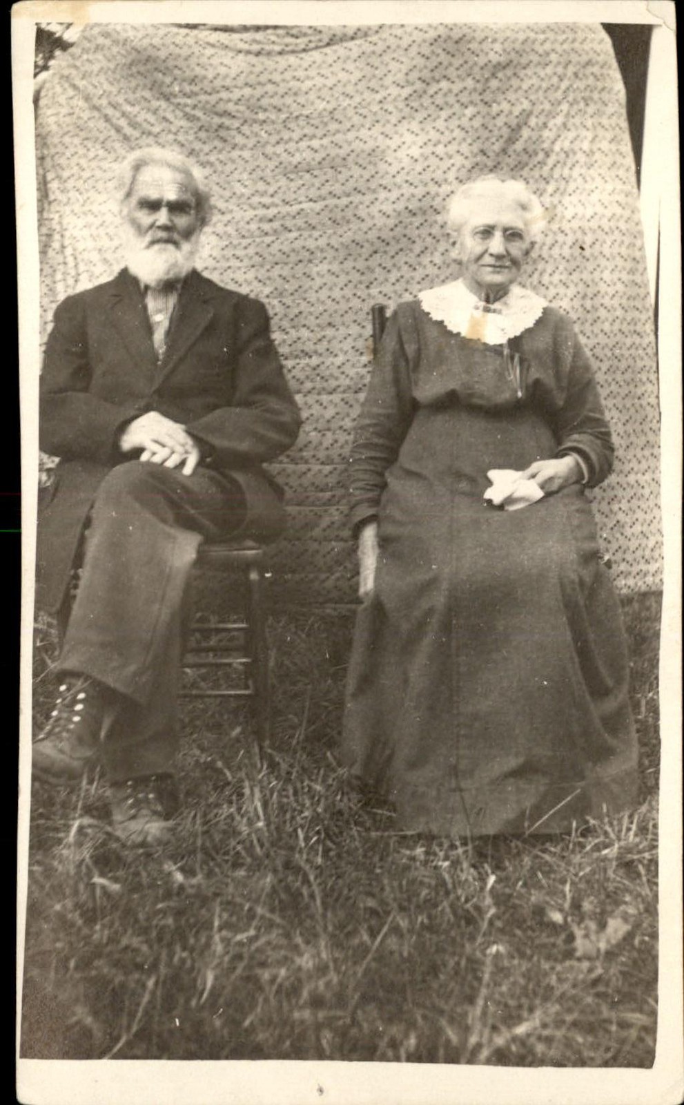 Elderly couple Posing in Front of Quilt - Quilting c1910 RPPC Postcard bhn