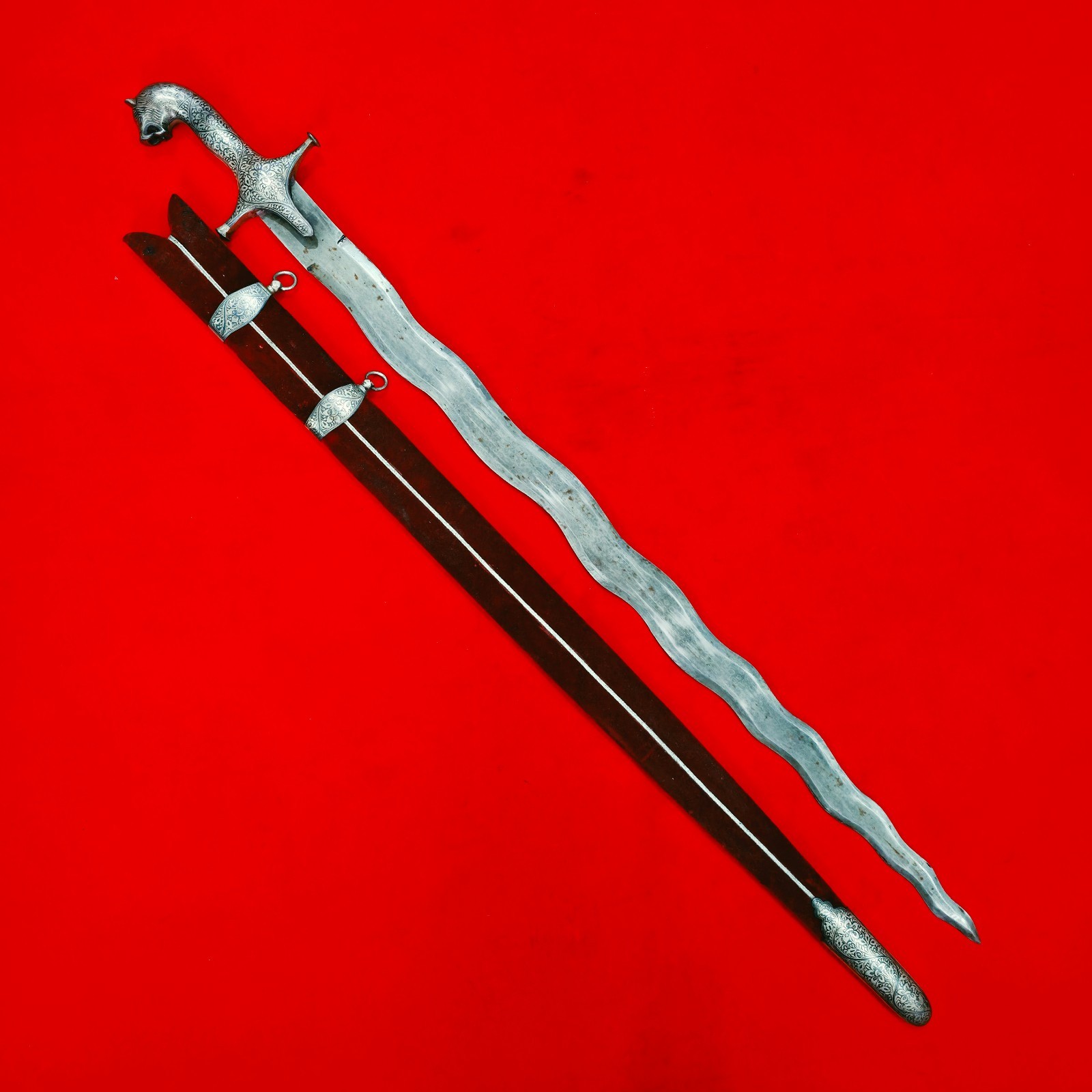 Indo-Persian Mughal Rajput Sikh Silver Koftgari Serpentine Damascus Sword Tulwar Indo-Persian Mughal Rajput Sikh Silver Koftgari Serpentine Damascus Sword Tulwar