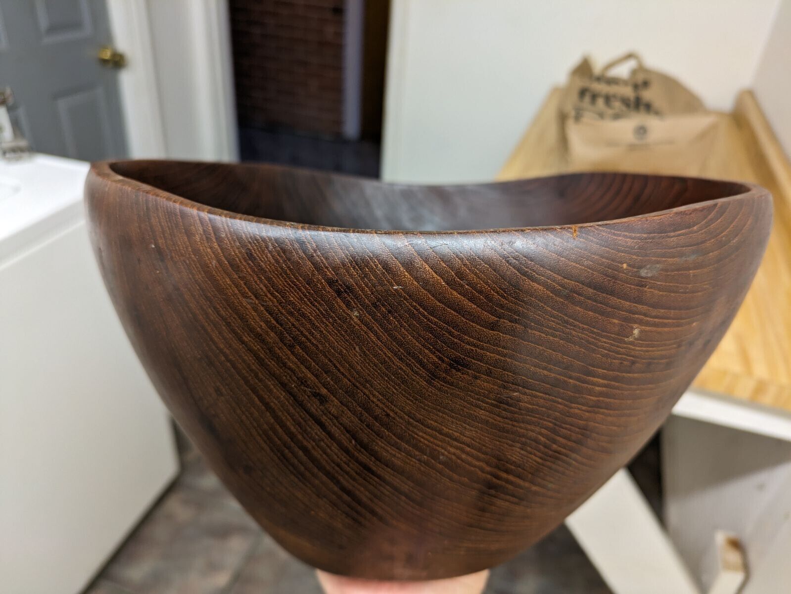Vtg. large dark wood deep serving bowl with bobbing edge.