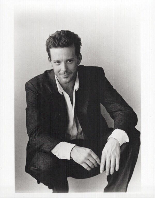 Mickey Rourke young pose in suit crouching down 9 1/2 Weeks 8x10 inch photo