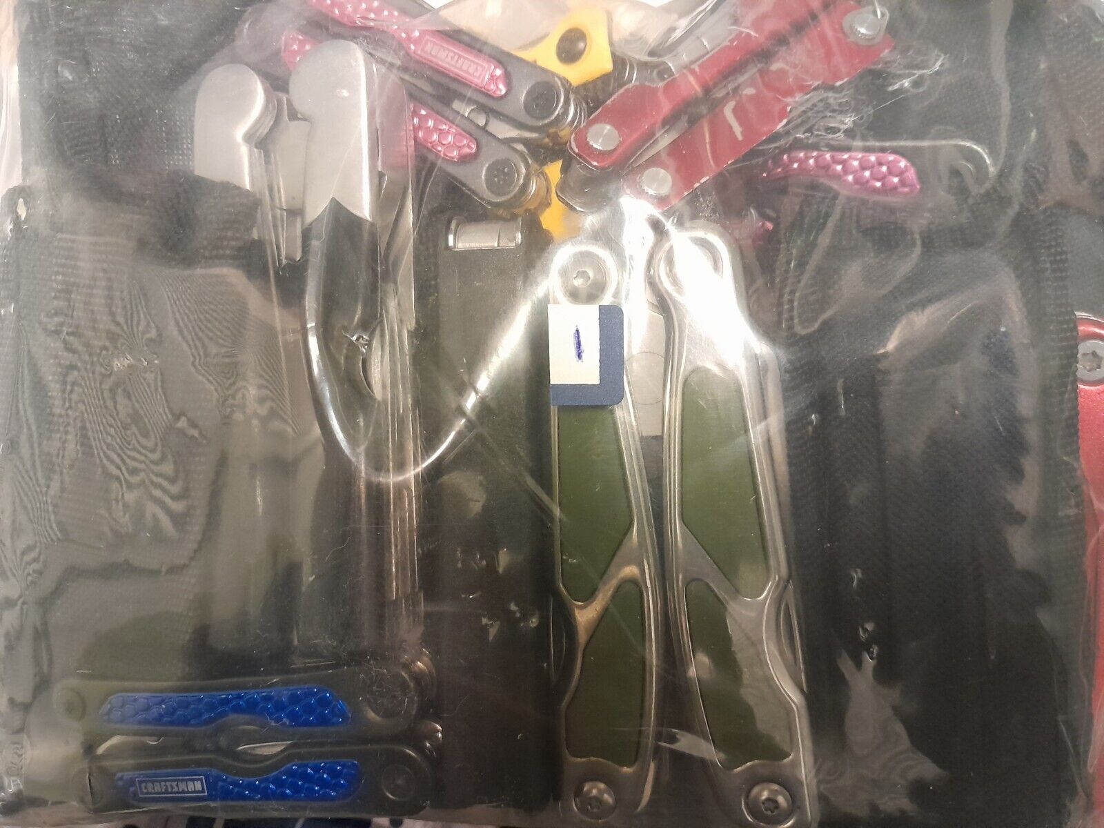 11lb Bag Of Assorted Multi Pocket Knives And Tools