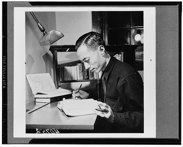 Photo:Man Writing at Desk 1900s Study Lamp Books Black and White Photo
