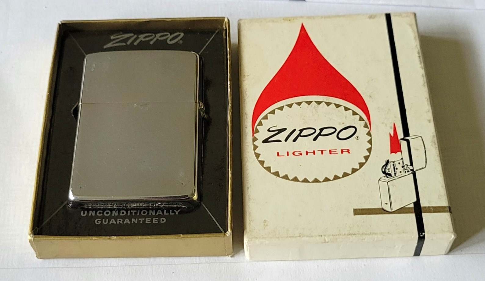 Vintage 1966 Zippo Windproof Pocket Lighter w/ Original Box & Guarantee Paper Vintage 1966 Zippo Windproof Pocket Lighter w/ Original Box & Guarantee Paper