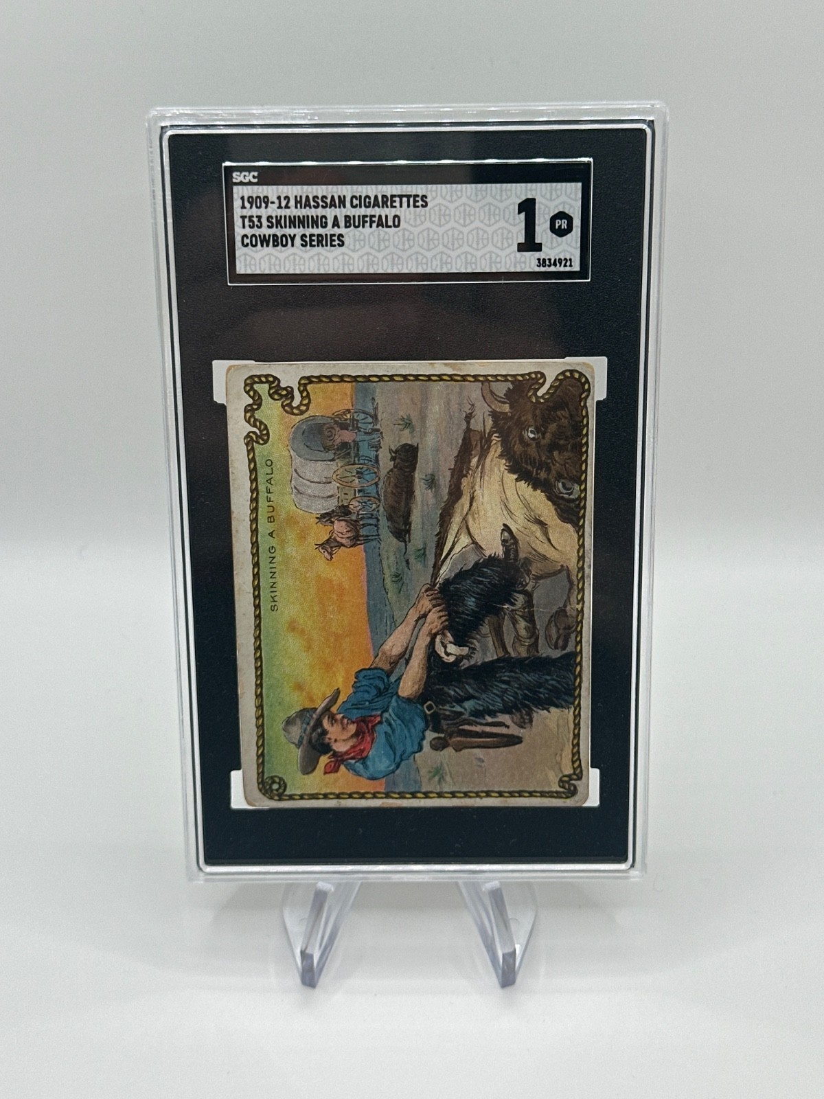 1909-12 Hassan Cigarettes Cowboy Series - Skinning A Buffalo SGC Authentic