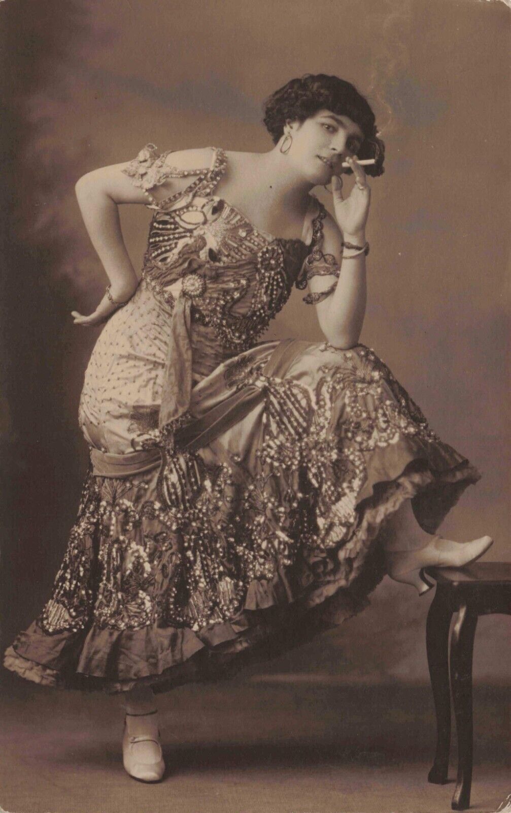 RPPC Woman Smokes Cigarette Elaborate Dress Costume Vintage Real Photo Postcard