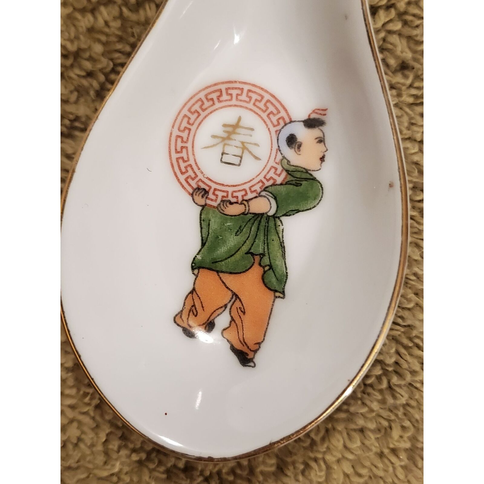 Vintage Chinese Porcelain Spoon With Boy Holding Symbol Design