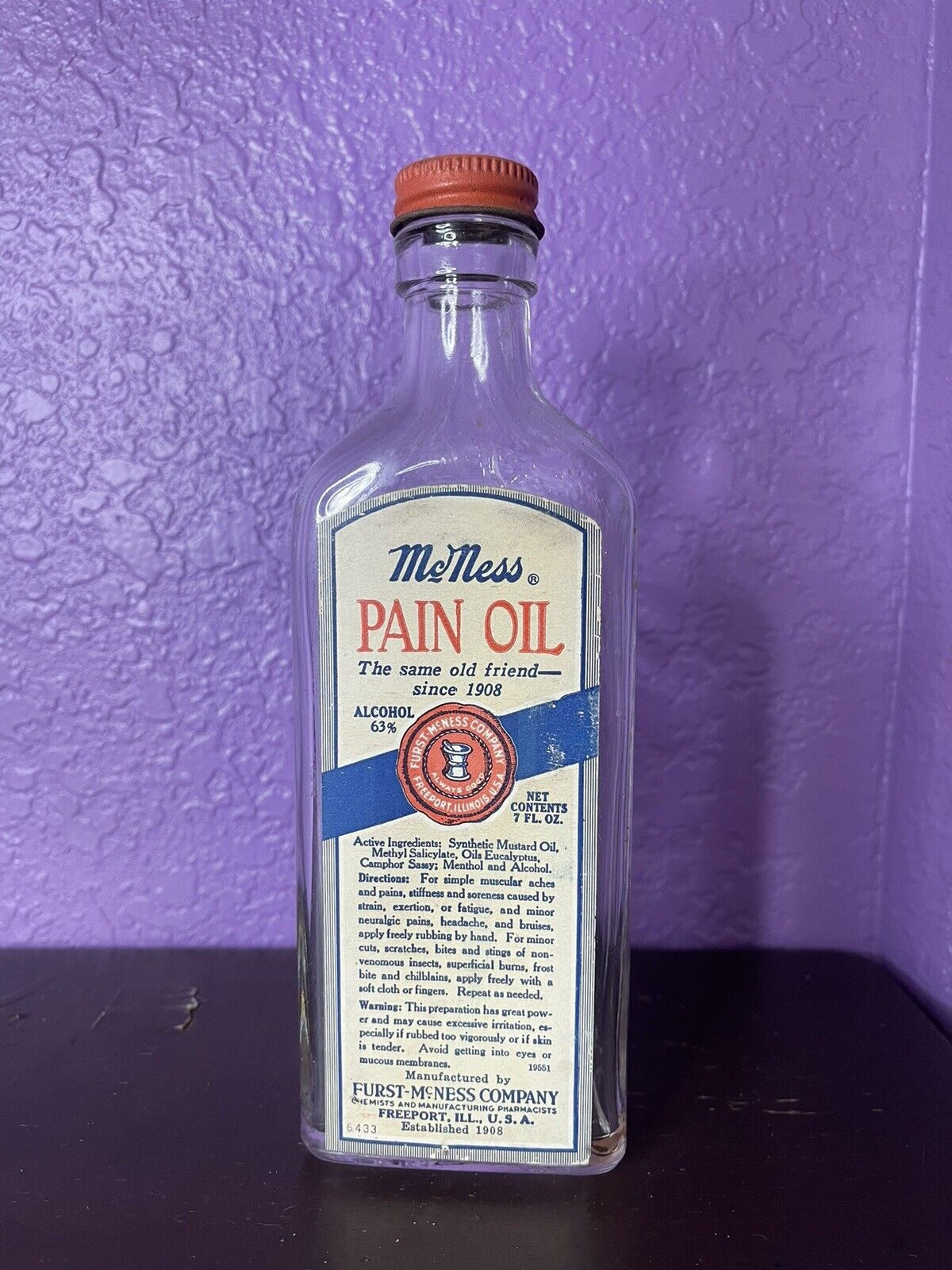 1930’s 7 Ounce McNess Pain Oil Bottle 