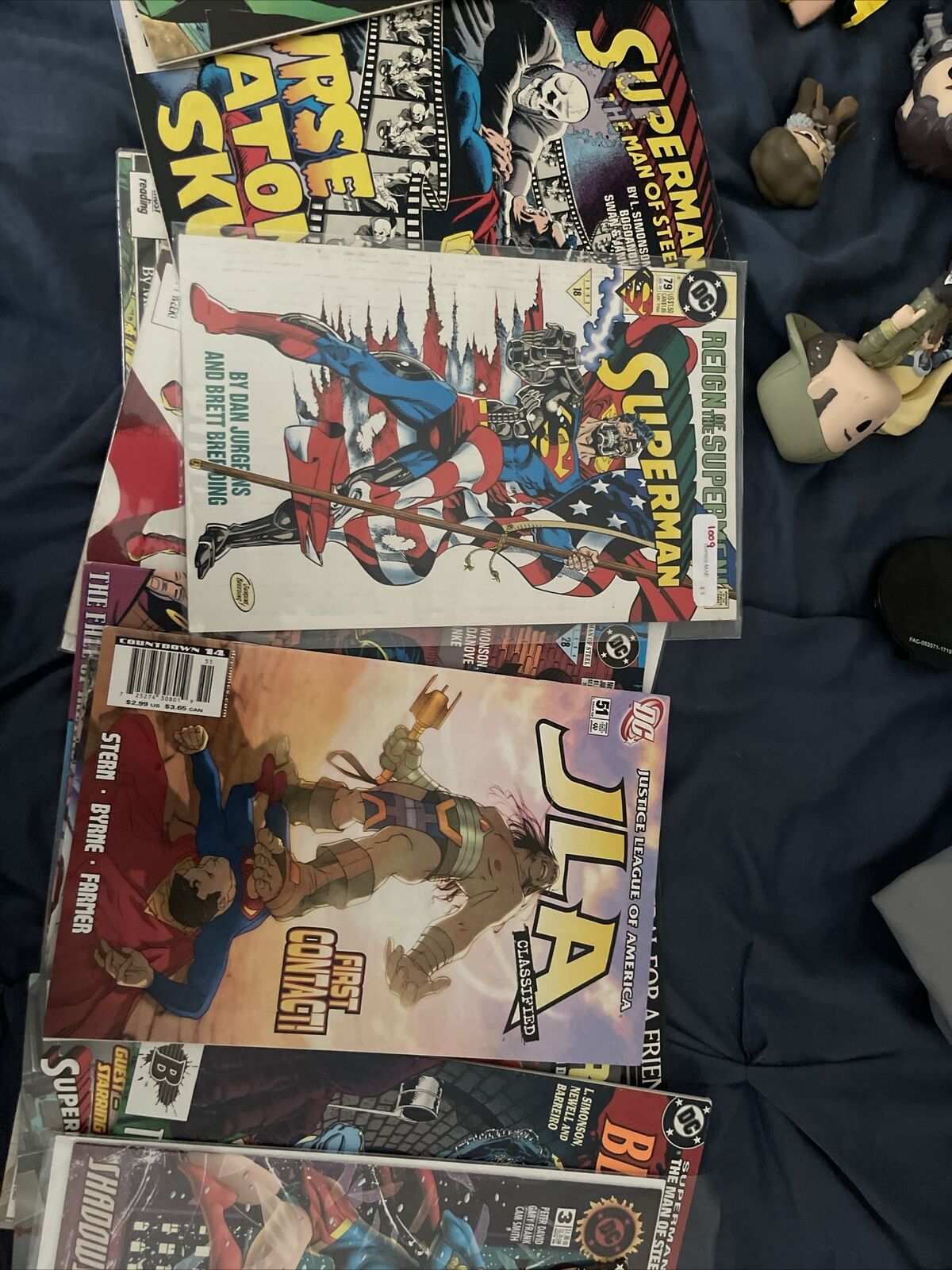 Lot of superman comics (26) Includes 3 Super girl comics and JLA comics.