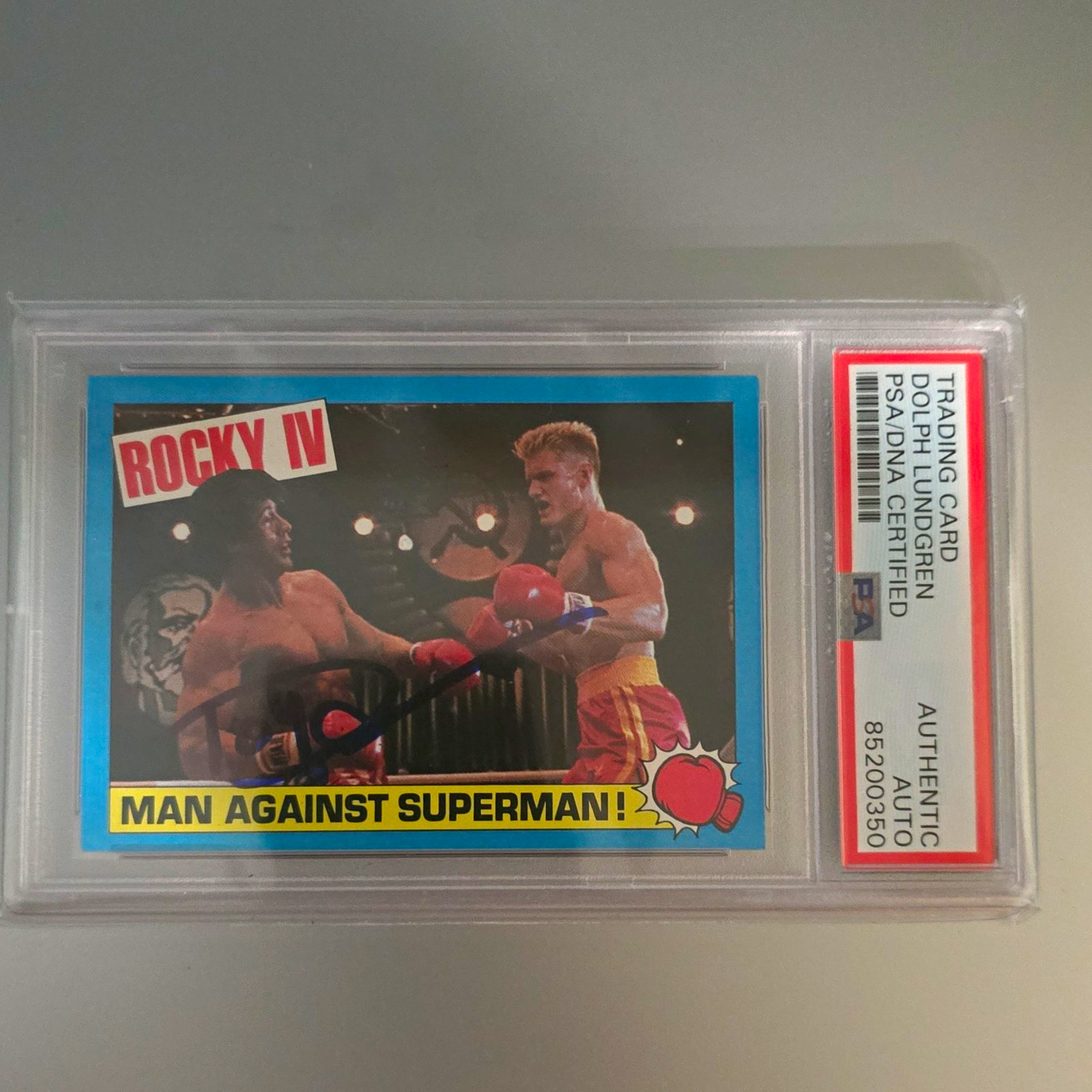 1985 TOPPS ROCKY IV #1 MAN AGAINST SUPERMAN DOLPH LUNDGREN PSA AUTO 1985 TOPPS ROCKY IV #1 MAN AGAINST SUPERMAN DOLPH LUNDGREN PSA AUTO