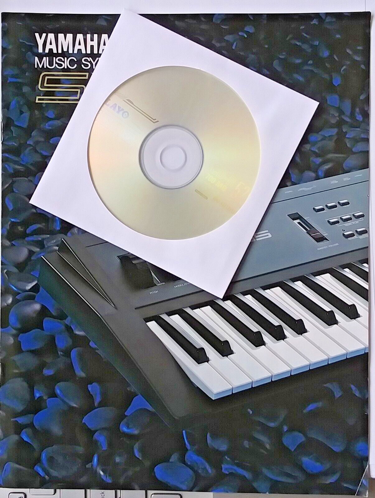 Yamaha SY55 Keyboard Original Color Brochure + SY/TG55 Sysex Voice Banks on CD.
