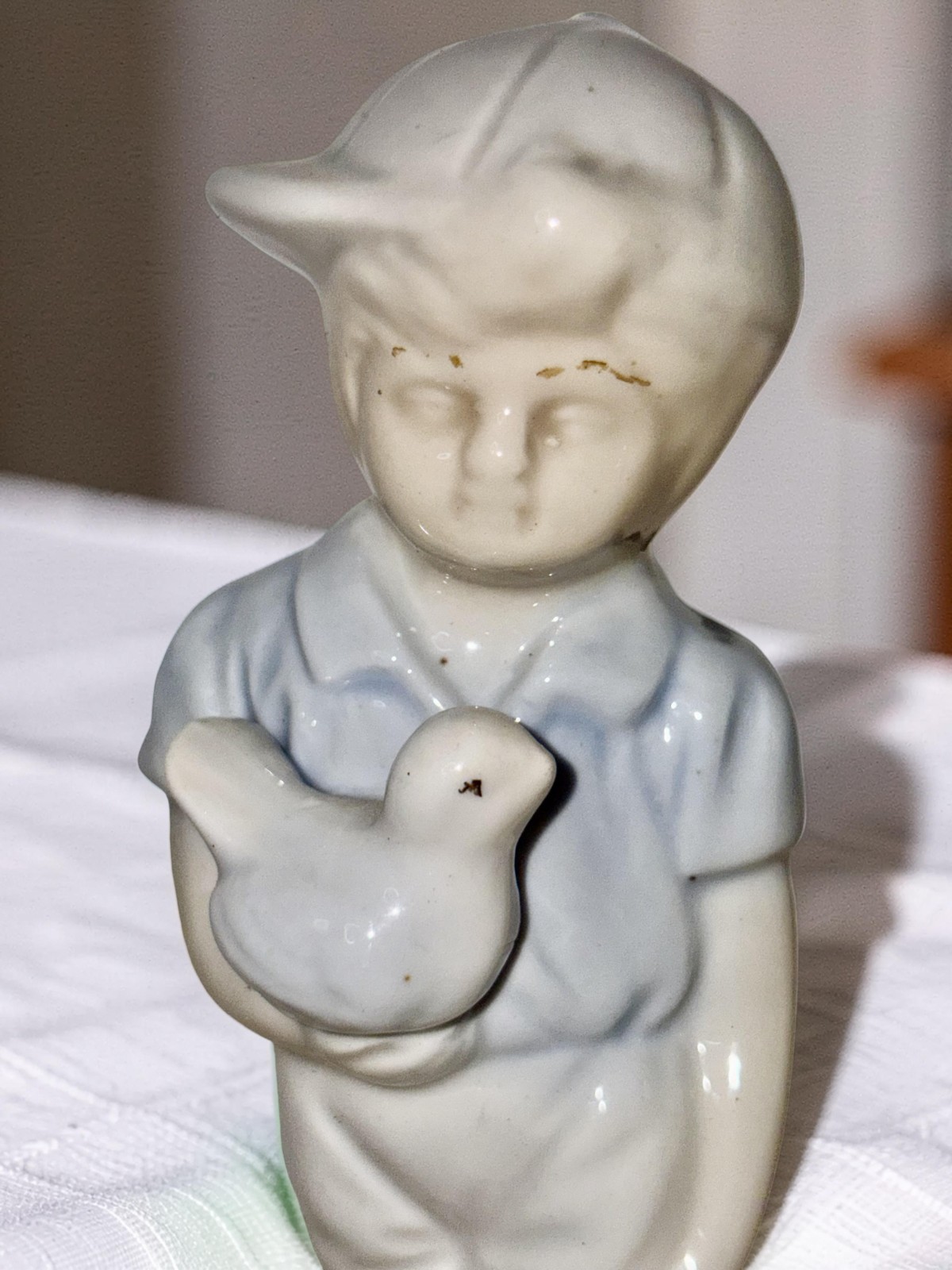 Vintage Porcelain Boy with Bird Figurine 6\
