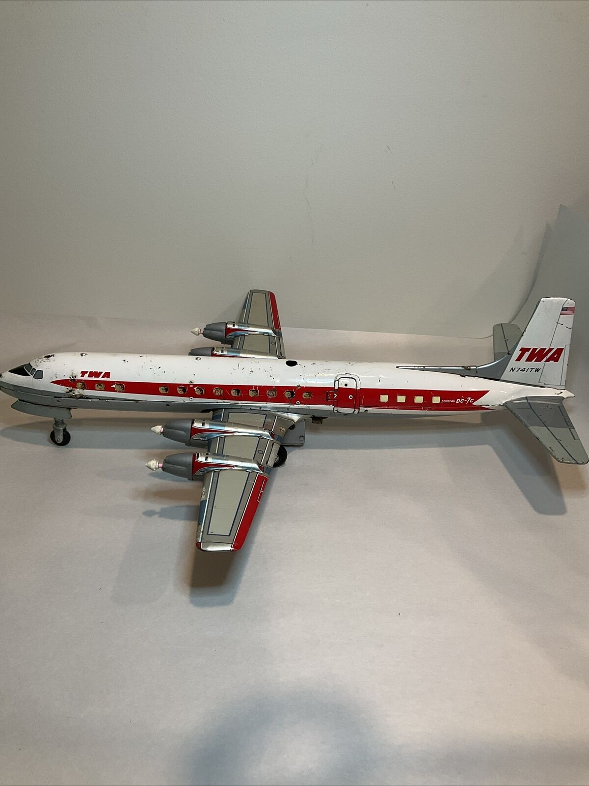 1960’s TWA DC - 7c Airplanes litho battery op TWA by Cragstan Japan parts or rep