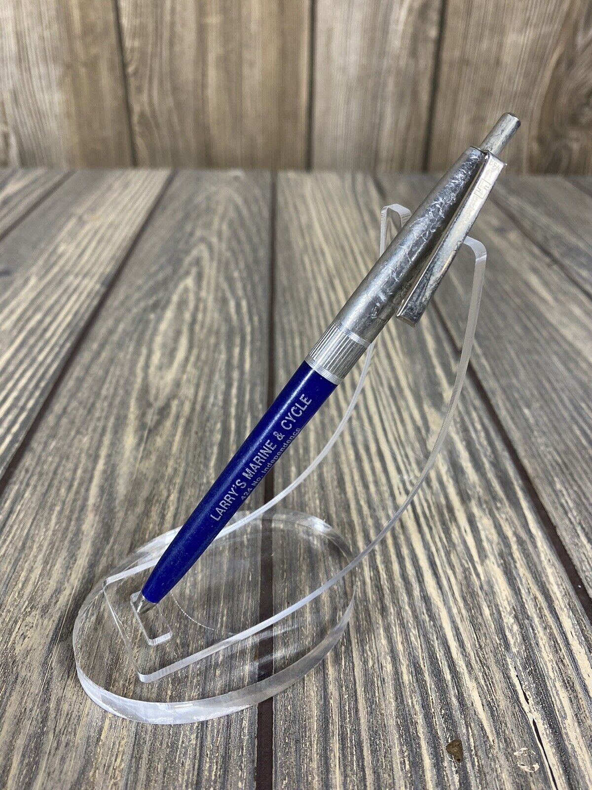 Vintage Larry’s Marine and Cycle Blue Retractable Pen Advertisement