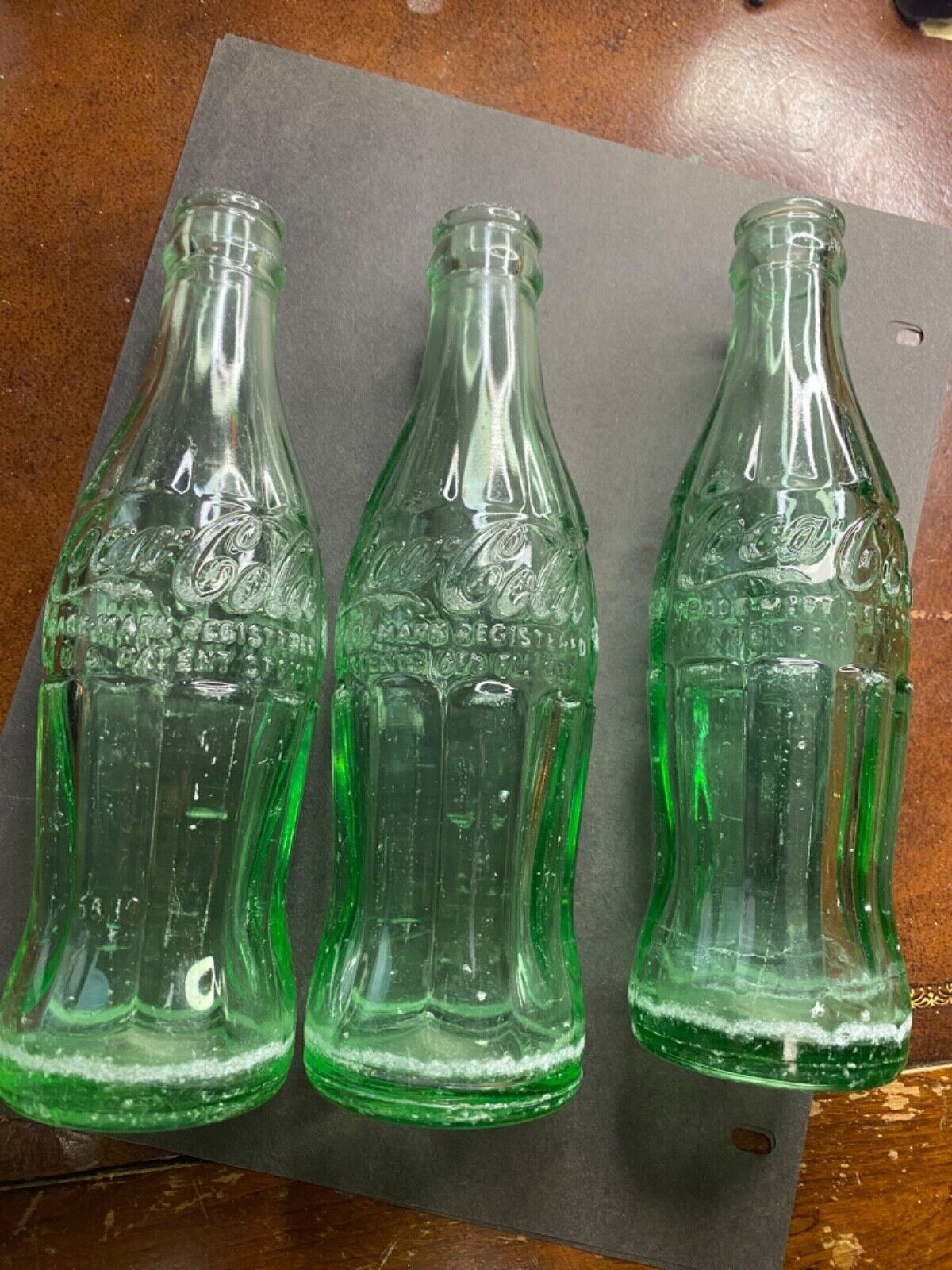 Vintage 1960\'s Coca Cola 6 1/2 oz. Soda Bottle Hobble Skirt Green Glass Set of 3