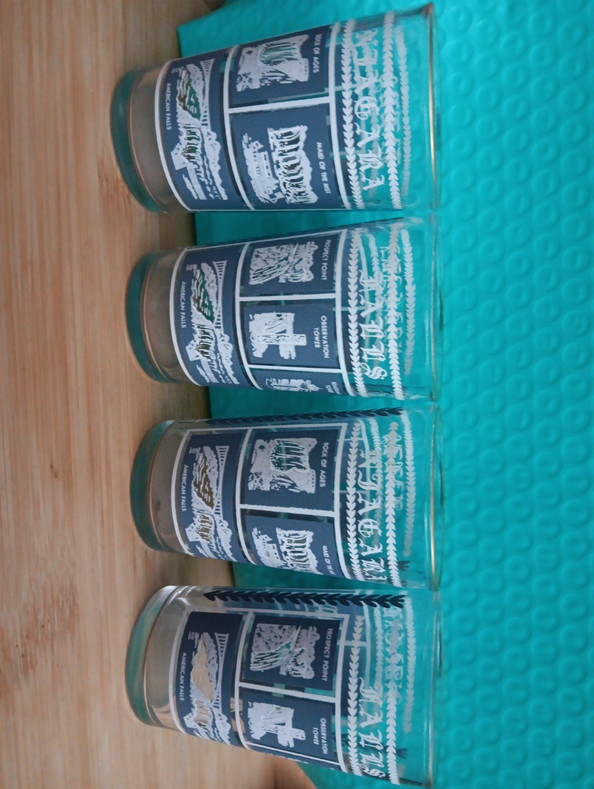4 Vintage NIAGRA FALLS souvenir glasses/ tumblers. cups blue white gold 5 4 Vintage NIAGRA FALLS souvenir glasses/ tumblers. cups blue white gold 5