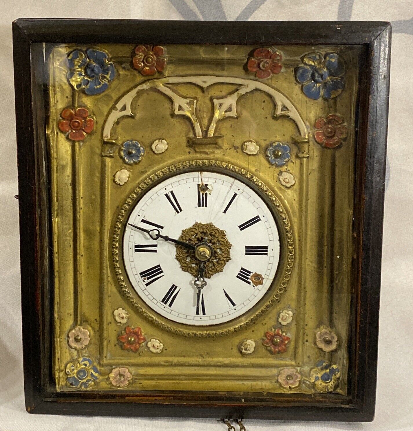 Antique Late 19th Century Black Forest Frame Pressed Brass Wall Clock Polychrome
