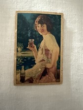 ANTIQUE ADVERTISING 1924 PREMIUM COCA COLA LADY w/ COKE GLASS SEWING NEEDLEPACK  picture