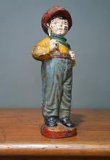 Antique Cast Iron Doorstop Boy Paperboy Vintage Statue RARE picture