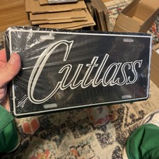 1969 Oldsmobile Cutlass/442/F85 ACCESSORY LICENSE PLATE Sealed picture