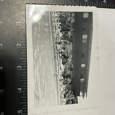 Vintage 1955 Black & White Poolside Photograph with People Lounging picture