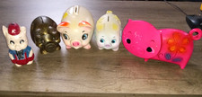 vintage piggy banks - 1970's - brass 4 banks and one pig picture
