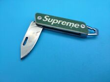 USED Supreme True Modern Keychain Knife - GREEN Logo SS22 a picture
