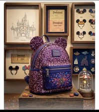 the Loungefly Disneyland Paris 30th Anniversary Purple Sequin Backpack picture